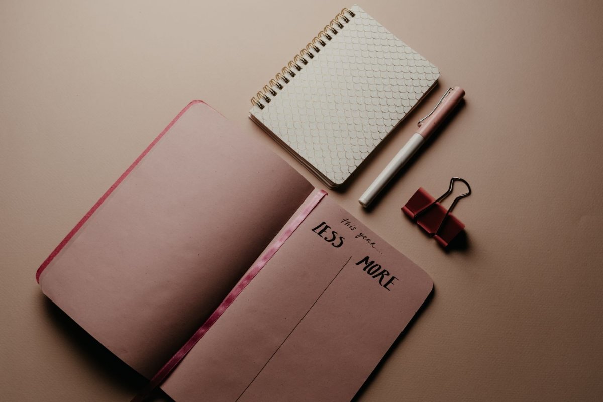 A notebook and pen on a table, ready for a plan.